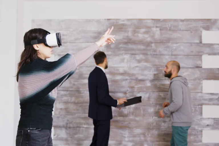 Interior designer using AI-powered software and 3D visualization technology while selecting materials and creating a luxury home interior